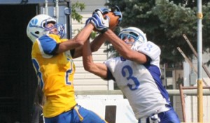 Kyle Ball of Victor and Mac Bignell of Drummond (3) battle for the ball at the goal line. Bignell came up with the ball but Victor came back to score when Ball caught another touchdown pass. Jean Schurman photo