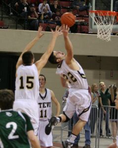 Twin towers, Zach Gavlak and Jesse Sims, controlled the boards for Stevensville in the state champioinship game and the tournament as Stevi claimed their first state championship. Jean Schurman photo