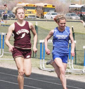 The closest race of the day was the girls'  200 where Florence's Hannah Porch (right) bested Kaitlyn Frost of Corvallis by 3/100ths of a second. Jean Schurman photo