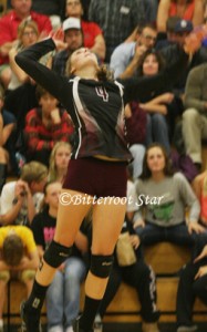 Florence’s Megan Byrne goes up for a kill against Loyola on Thursday. Florence won in three games and remained undefeated. Jean Schurman photo
