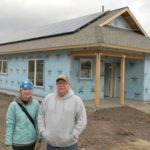 Architect for the latest Habitat for Humanity house going up in Stevensville, Meghan Hanson of Natural Dwelling Architecture, is pictured here along with project foreman Rick Wiesmann in front of the solarized home.