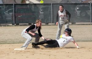 Stevensville’s Jenna Lockman slides into second base as Hamilton’s Taylor Goligoski gets ready to catch the throw to second and teammate Lauren Dolcater backs her up. Jean Schurman photo