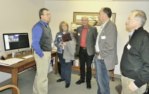 Stevensville School District Superintendent David Whitesell, left, shows local Representatives Nancy Ballance and Ed Greef and Senators Pat Connell and Fred Thomas how activity on the school grounds can be monitored live on a central computer screen. Michael Howell photo.