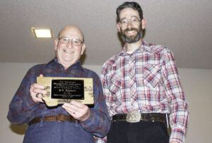 B.P. (Prescott) Hackett was recognized by the Bitterroot Stockgrowers Association with a Lifetime Achievement award. It was presented to him by his son, Scott, a past president of the organization. Jean Schurman photo.