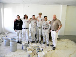 Students of Trapper Creek Job Corps recently gave the North Valley Public Library community room a “make-over.” The community room was in dire need of a paint job and the Trapper Creek Job Corps stepped in to help get the job done. “The ceiling had water damage and all the walls had different textures,” said Painting Instructor Doug Wilson. He and his team spent the last two weeks priming and painting and doing a little “hand bouquetting” for a uniform texture on all the walls. The Trapper Creek Jobs Corps painting crew included Cody Finley, Dillon Fields, Jacob Hezel, Riley Morris, Neneka Sewers and Painting Instructor Doug Wilson. Michael Howell photo.