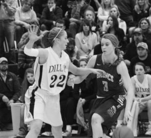 Taylor Goligoski of Hamilton tries to get past Dillon’s Audrey Schurg in the Southwest A championship game. Hamilton won and will advance to the state tournament that begins on Thursday in Hamilton. Jean Schurman photo