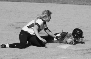 Hamilton first baseman, Shaylan Mohn tries to tag out Stevensville’s Megan Finley. Jean Schurman photo.