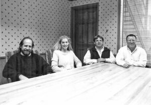 This photo from an earlier time shows Earth & Wood partners (l to r) Randy Hodgson, Marla Hennequin, Harold McGaughey and Gus Johnson, who have sold the business after more than 36 years as owners. This landmark Bitterroot business was honored as Montana’s Small Business of the Year in 2000. Stephanie and Brad Taylor are the new owners.
