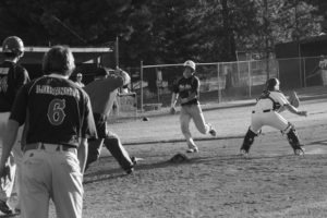 All eyes are on home base as a Red Sox player races in for the tying run at home. Jean Schurman photo.