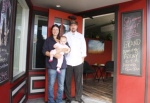 Angie and Eric Loessberg, owners of Mission Bistrio in downtown Stevensville, with Emma, the restaurant’s mascot. Angie handles the business end while chef Eric runs the kitchen. Jean Schurman photo. 