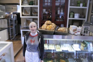 Alison Bowcutt, owner of Red Rooster Artisan Bakery in Hamilton, with some of the day’s offerings. Randi Burdette photo.