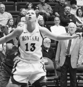 Lady Griz Alycia Sims watches for the rebound as UM coach Robin Selvig keeps an eye on the play. Jean Schurman photo.