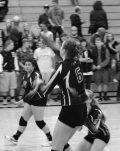 Florence’s Sabrina Hopcroft goes for the kill as Kezia Ward watches the action. Jean Schurman photo.