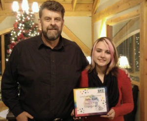 Max Coleman, broker/owner of Exit Realy Bitterroot Valley, presented Sadie Mauk of Victor with a Youth in Action award for her community service activities. Names of other deserving youths can be submitted to Exit at 375-9251.