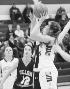 Hamilton’s Caitlin Gillespie goes up for a shot against Dillon. Jean Schurman photo.