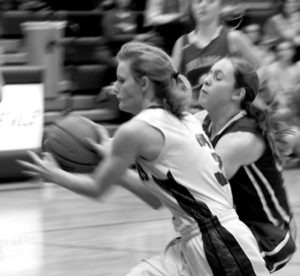 Corvallis’ Taia Tully races to the basket for a lay up. Jean Schurman photo 