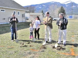 Breaking ground for the next Habitat for Humanity home in Stevensville are Habitat for Humanity Board Chairman David Haywood, new home owner Courtney Cords and daughter, Ravalli County Commissioner Greg Chilcott and Stevensville Mayor Paul Ludington. Michael Howell photo. 