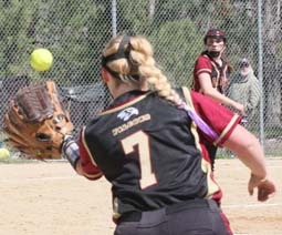 Florence pitcher throws to first baseman Sarah Schurg for the out against Mission. Jean Schurman photo