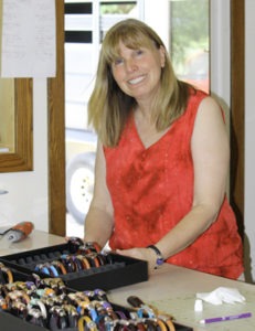 Leatherwork artist Olive Parker operates a thriving business selling her creations. She credits the Montana Artrepreneur Program for teaching her what she needed to know to make that happen. Daphne Jackson photo.