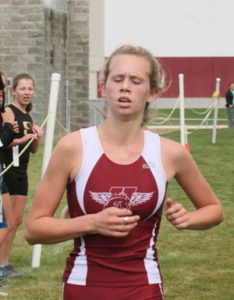 Jacie Schmalz of Hamilton won the girls’ cross-country race. Jean Schurman photo.