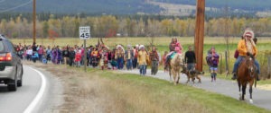 About a hundred Salish Indians walked into Stevensville last Saturday. For some it was the culmination of a fifty-eight mile walk from the Jocko Church on the Flathead Reservation, tracing in reverse the same route that was taken by their ancestors when they were forcefully expelled from their homeland in 1891. Michael Howell photo.